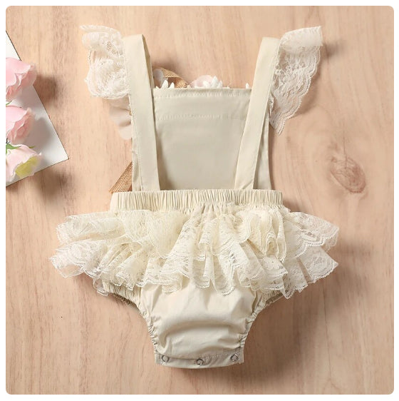 Girls romper with lace detailing